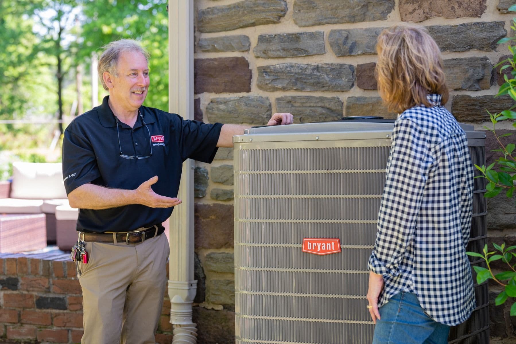 mike demonstrating air conditioning for customer