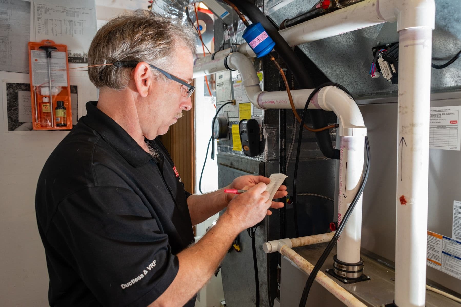 Mike-Inspecting-Heater-Philadelphia-Gas-Electric-Heating