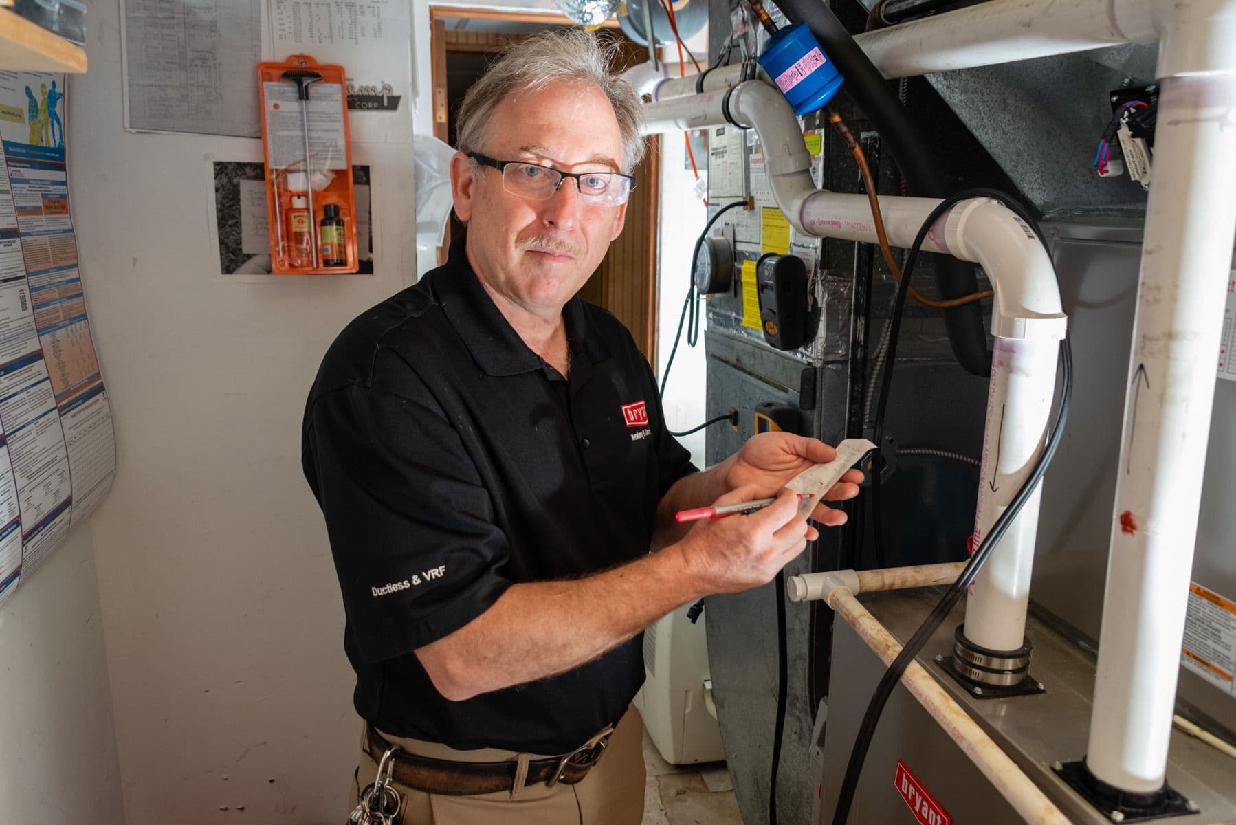 Mike-Inspecting-Heating-System-Philadelphia-Gas-Electric-Heating